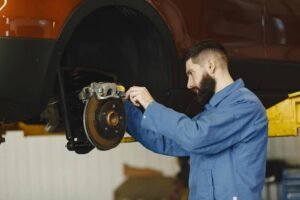 man-fixing-brakes